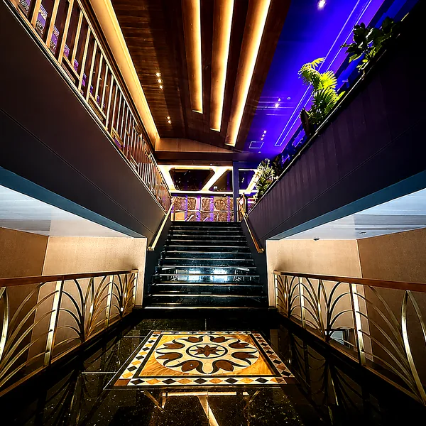 Multi-level staircase and lit atrium photo