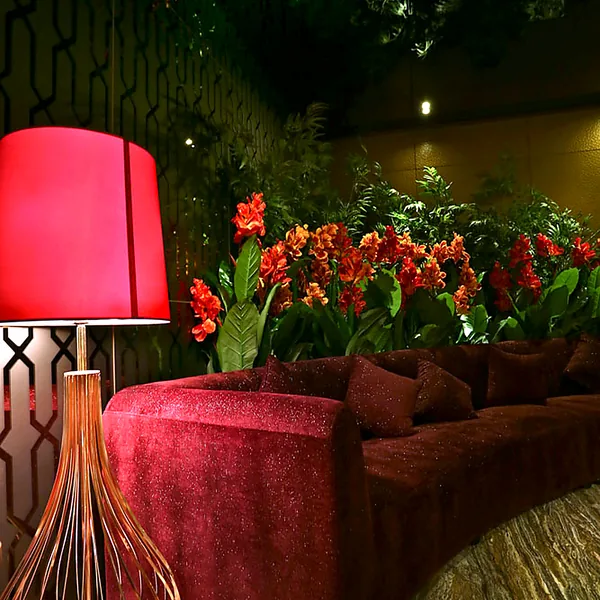 Red sofa lounge with warm lighting photo