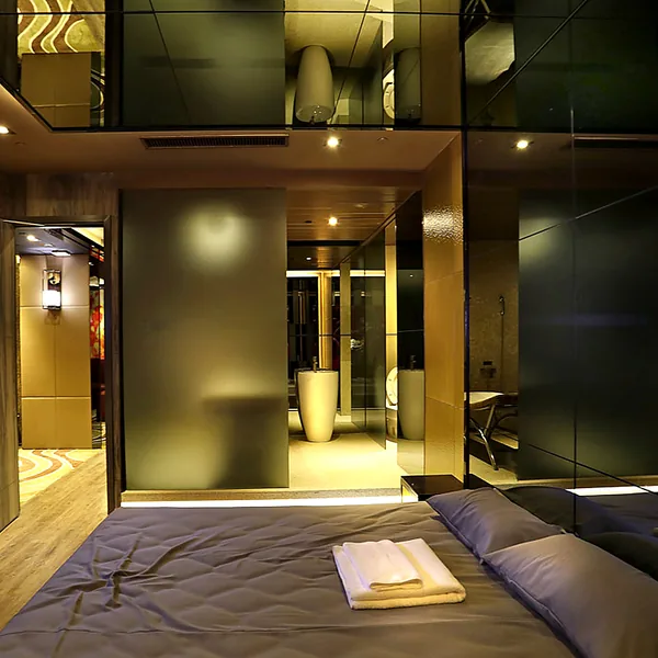 Private premium suite with bed and bath area for guests who value privacy photo