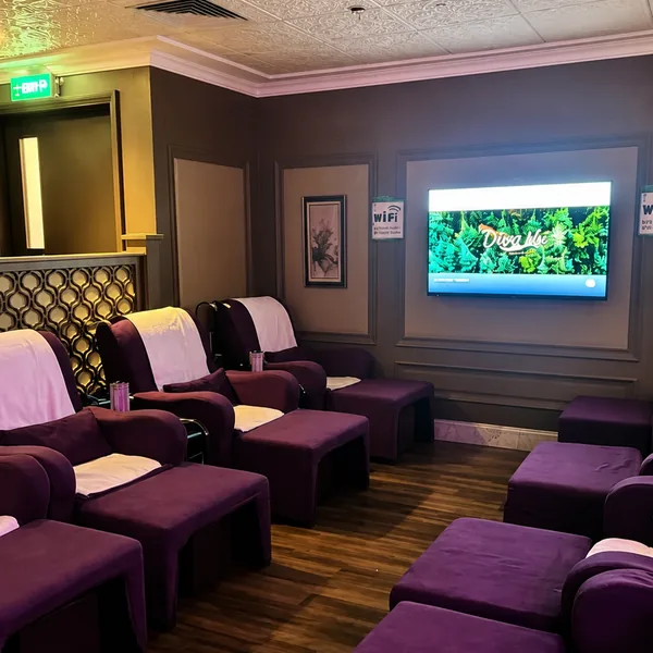 Purple recliner lounge for watching TV photo